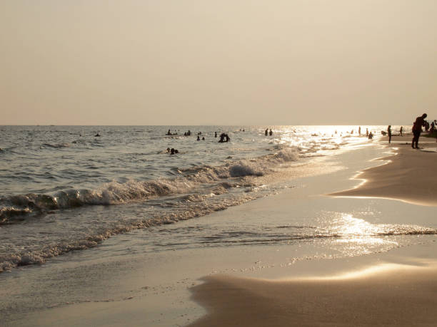 istock Close up beach and people silhouette 966399980