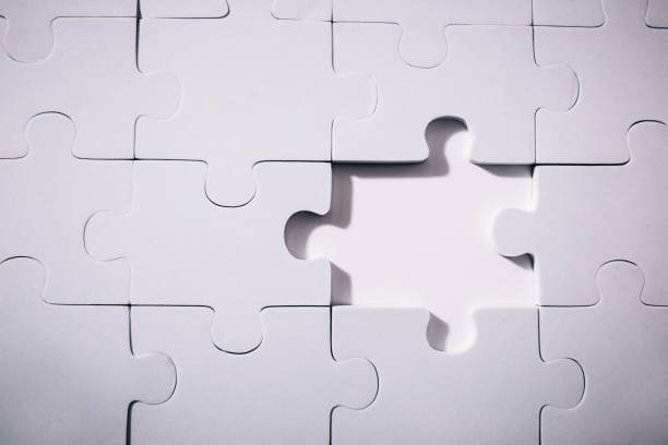 istock Empty and blank missing piece of jigsaw in white color background - business strategy and thinking solving problem concept. 966400998