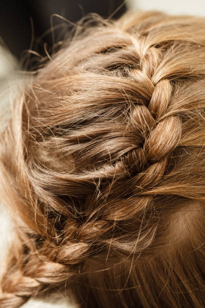 istock Blonde toddler girl getting her hairstyle done 966412048