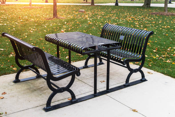 istock Steel Table with Benches in a Autumn Park at Sunset 966419538