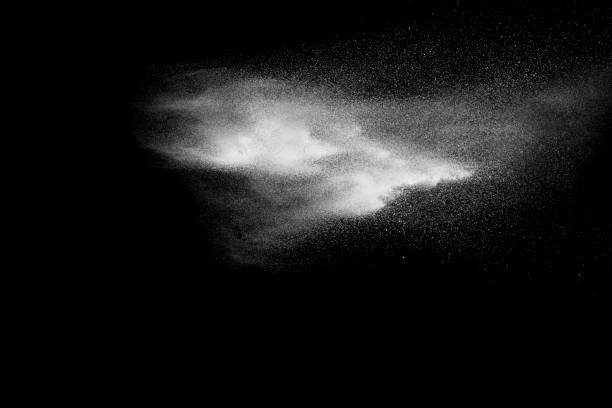 istock Launched white powder splash on black background. Bizarre forms of of white powder explosion cloud against dark background. 966419620