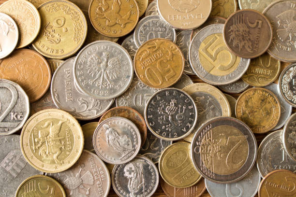 istock Many different coins on the table. Background of coins 966432320