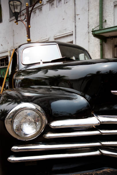 istock Vintage car in Jakarta old town 96643257