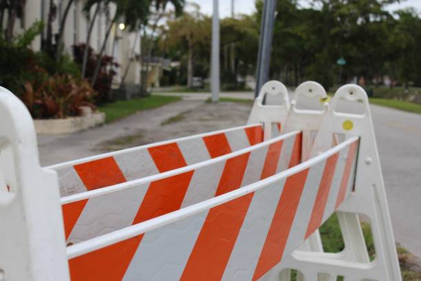 istock group of plastic, orange and white a-frame traffic barriers 966434196