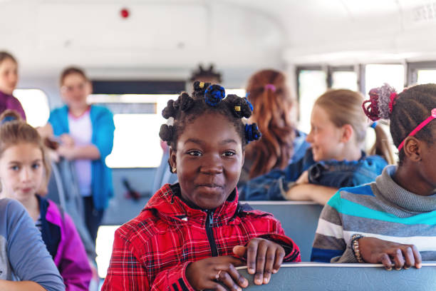 istock School kids in a bus 966434258