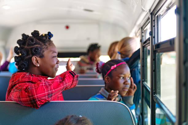istock School kids in a bus 966434600