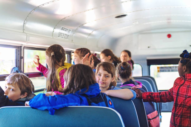 istock School kids in a bus 966434658