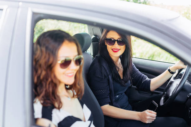 istock Friends in the car 966434912