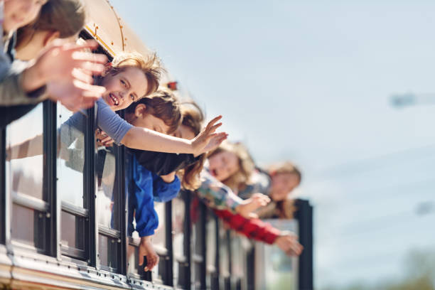 istock School kids in a bus 966435054