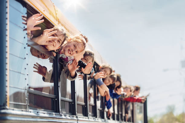 istock School kids in a bus 966435056