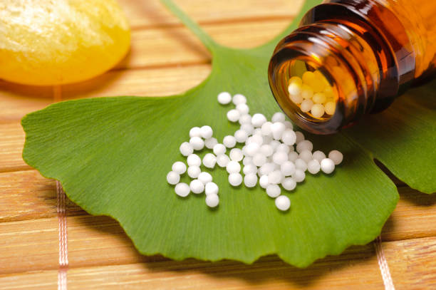 istock alternative medicine with herbal and homeopathic pills 966438596