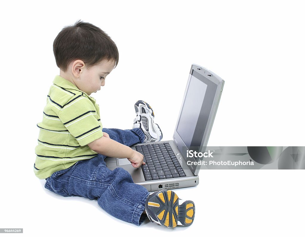 Adorable Boy With Working On Laptop Over White  Beautiful People Stock Photo