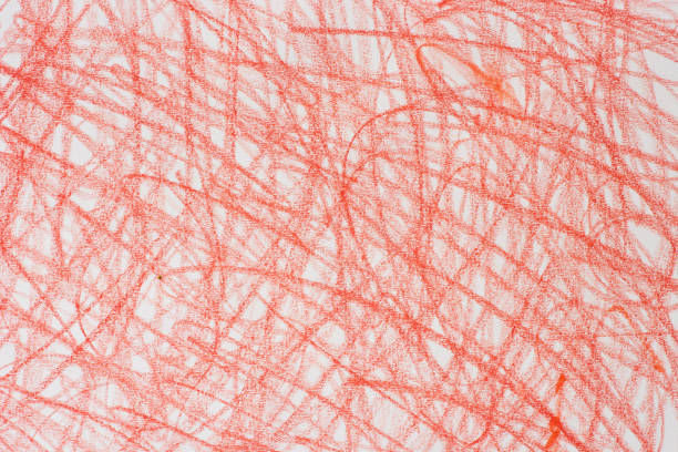 red crayon doodles on white paper background texture