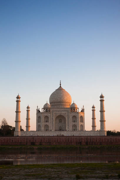 istock The Taj Mahal at Sunset in Agra, India 966449116