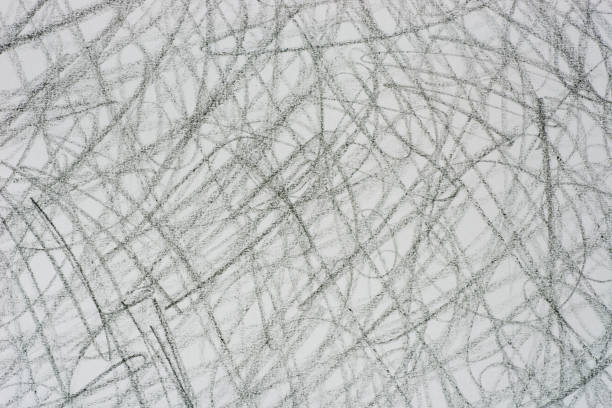 istock gray crayon doodles on paper background texture 966449264