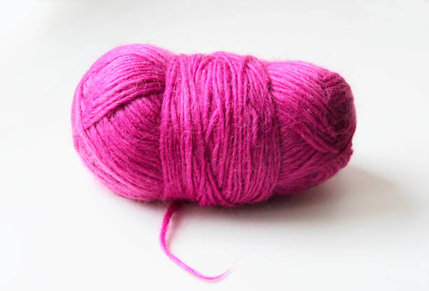 istock Coil of pink wool. Close-up 966449504