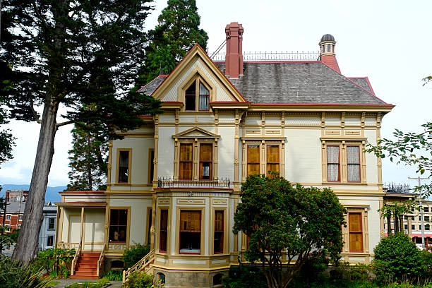 Galveston, Texas USA - May 6, 2014: Beautifully restored vintage home of the Queen Anne architecture style in the Silk Stocking Residential Historic District.