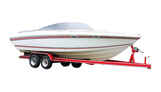 istock White and red boat on a red trailer against white background 96647326