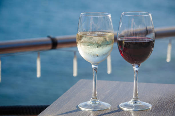 istock glass of white and red whine 966474618