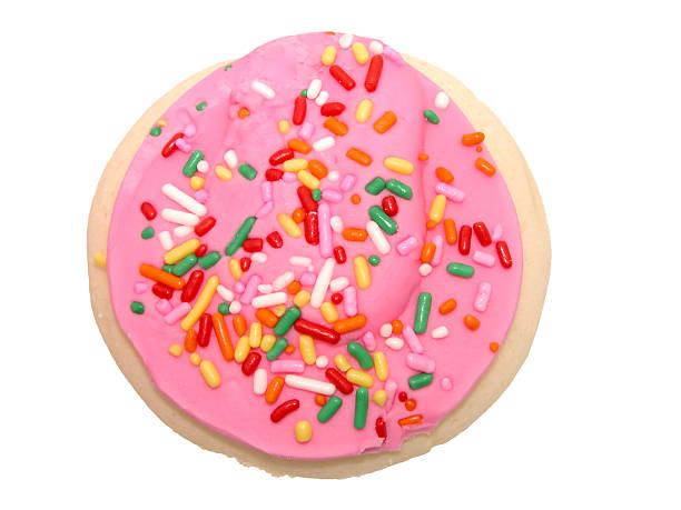 Cookie with Pink Icing and Sprinkles  icing stock pictures, royalty-free photos & images