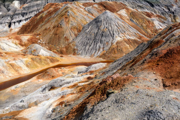 istock deserted canyon with an orange river 966489214