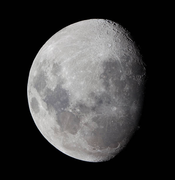 moon through 11 inch telescope stock photo
