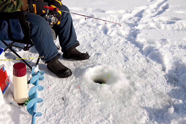 лед fisherman - ice fishing стоковые фото и изображения
