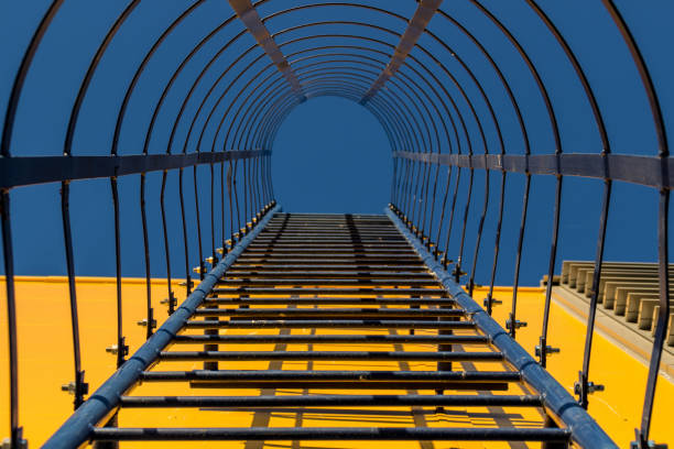 istock Fire escape to the sky on the yellow building 966503154
