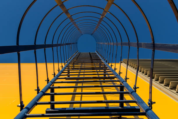 istock Fire escape to the sky on the yellow building 966503180