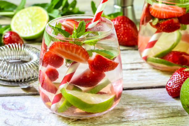 istock fresh lemonade with strawberries , lime and mint on a wooden background 966506952