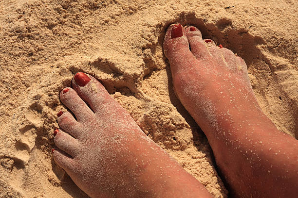 Deux pieds dans le sable - Photo