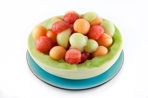 pelotas de melón honeydew bowl - melon balls fotografías e imágenes de stock