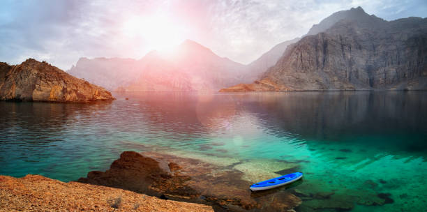 sea tropical dawn  landscape with mountains and fjords, oman - oman beach nature stone imagens e fotografias de stock