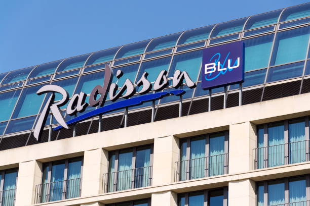 Radisson Blu hotels and resorts logo on the building of hotel stock photo