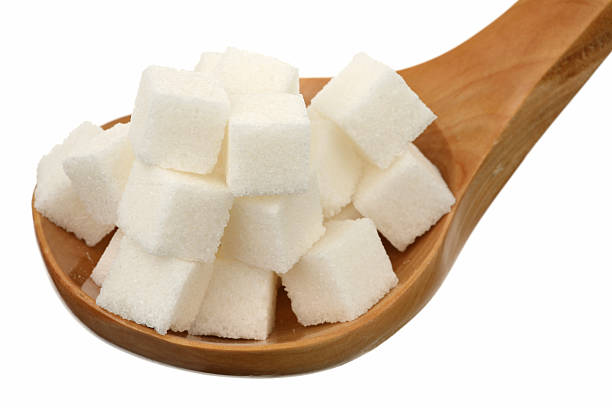 istock Sugar in a wooden spoon 96652960