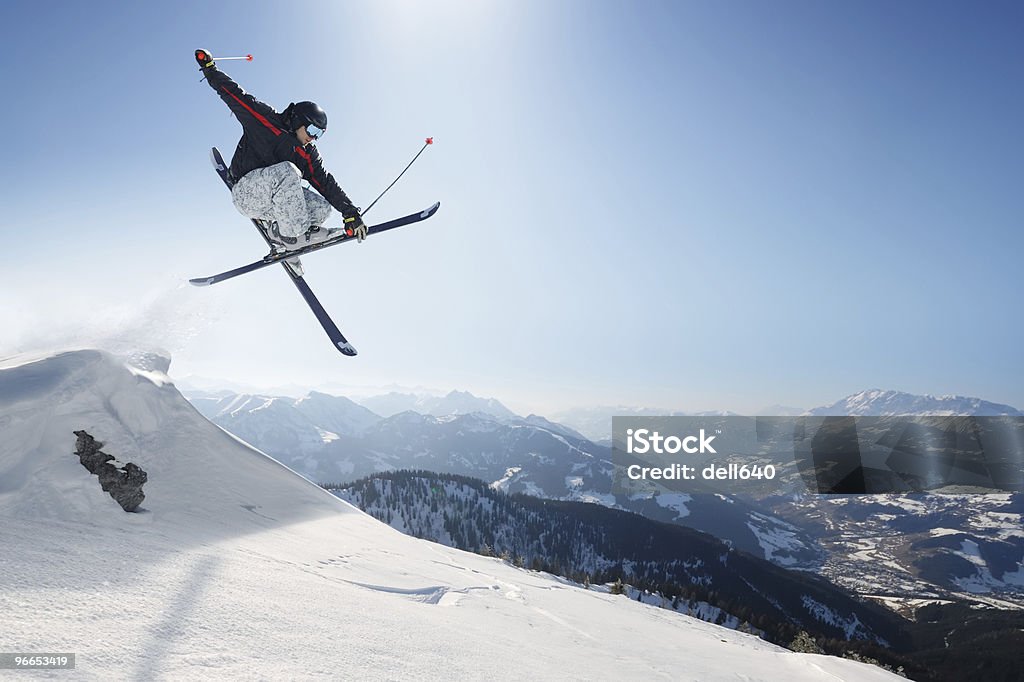 Jumping skier on a snowy mountain See others: Skiing Stock Photo