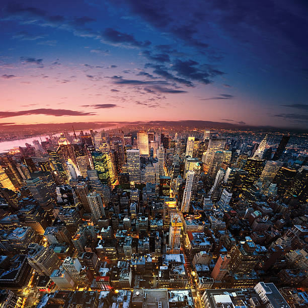 Overhead shot of New York City at dusk with sunset stock photo