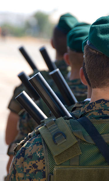 istock Military soldiers with uniforms and guns. 96653791