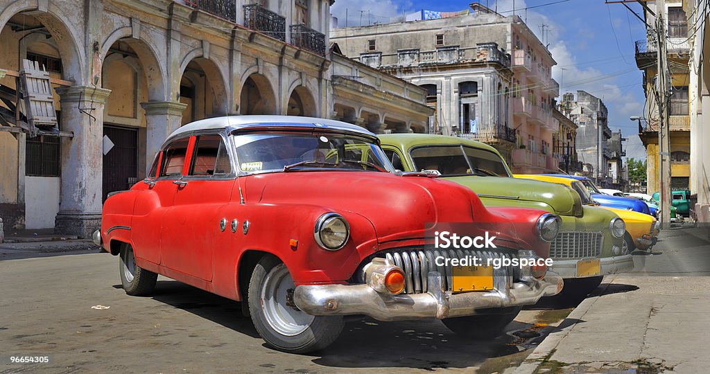 Havana street with colorful old cars in a row  Car Stock Photo