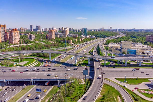 istock Aerial view of a freeway intersection. Road junctions in a big city 966549358