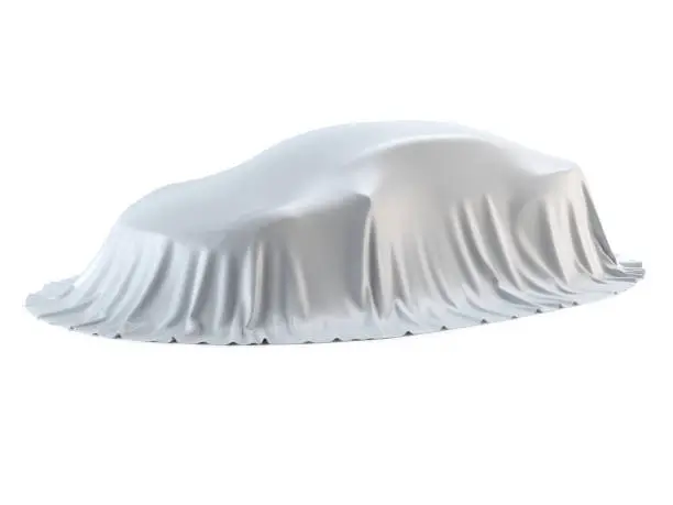 Photo of New car presentation, model reveal, hidden under white cover, isolated on white background