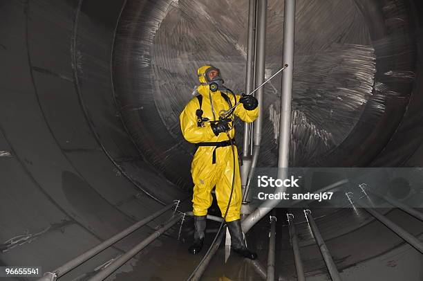 Man In Chemical Suit Stock Photo - Download Image Now - Cleaning, Industry, Storage Tank