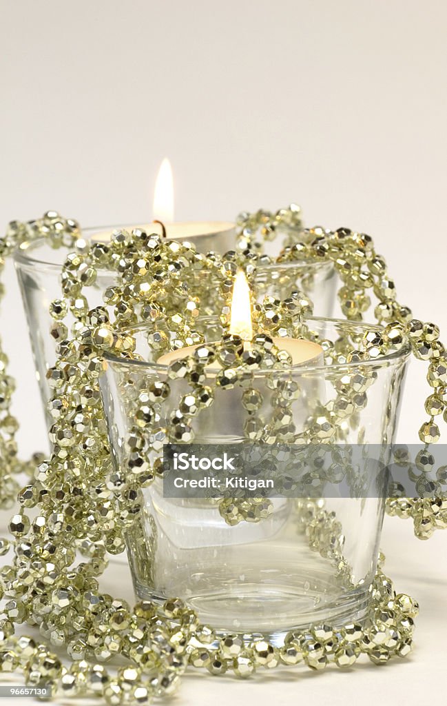 Due candele in vetro - Foto stock royalty-free di Arredamento