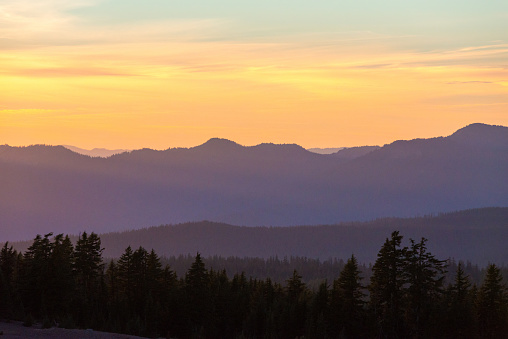 Silhouette of Mountains overlooking the Pacific Northwest during sunset