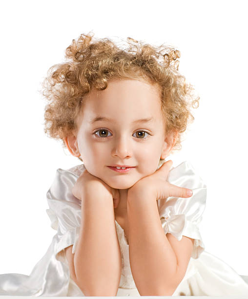 Bella dai capelli biondi Ricci bambina - foto stock