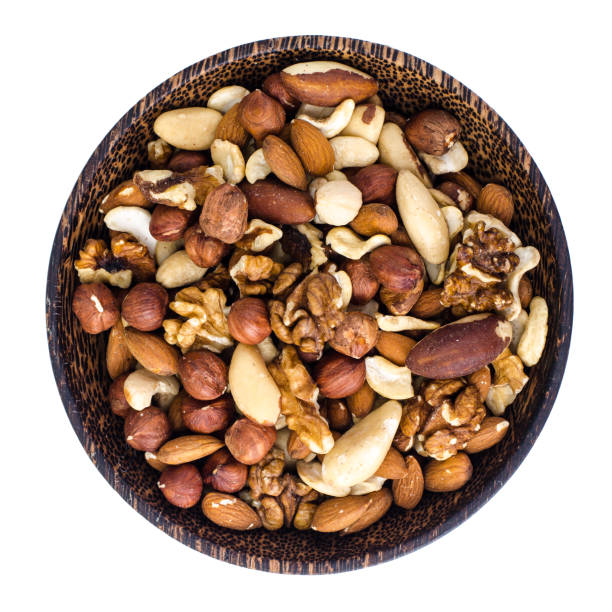 istock Mix of nuts on white background 966593822