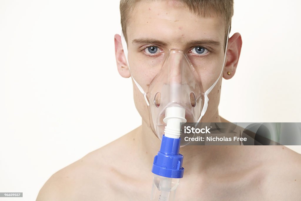 Asthmatic Asthmatic wearing nebuliser mask Adult Stock Photo