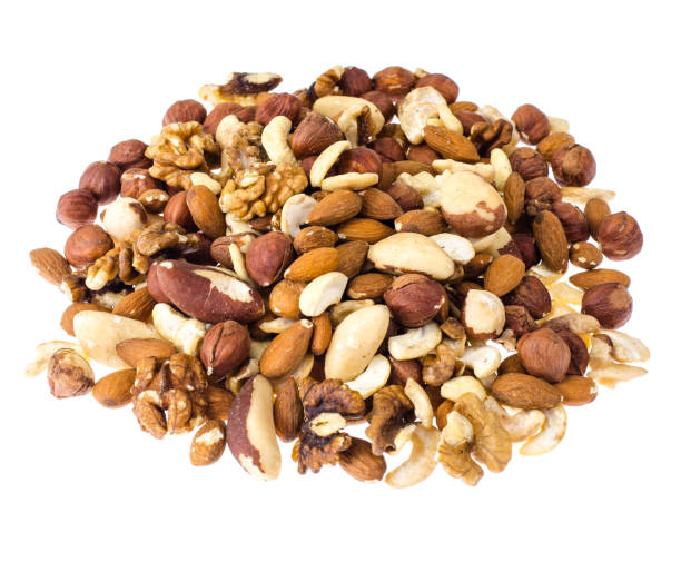 istock Mix of nuts on white background 966597904
