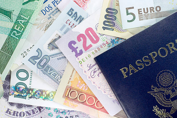 Passport and Foreign Currency  five euro banknote photos stock pictures, royalty-free photos & images