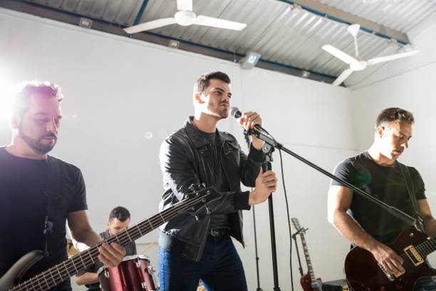 istock Rock band in music show 966642716